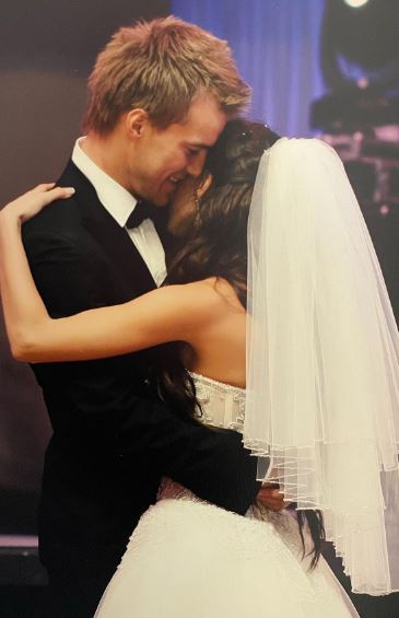 Inna Yarmolenko with her husband Andriy Yarmolenko on their wedding day